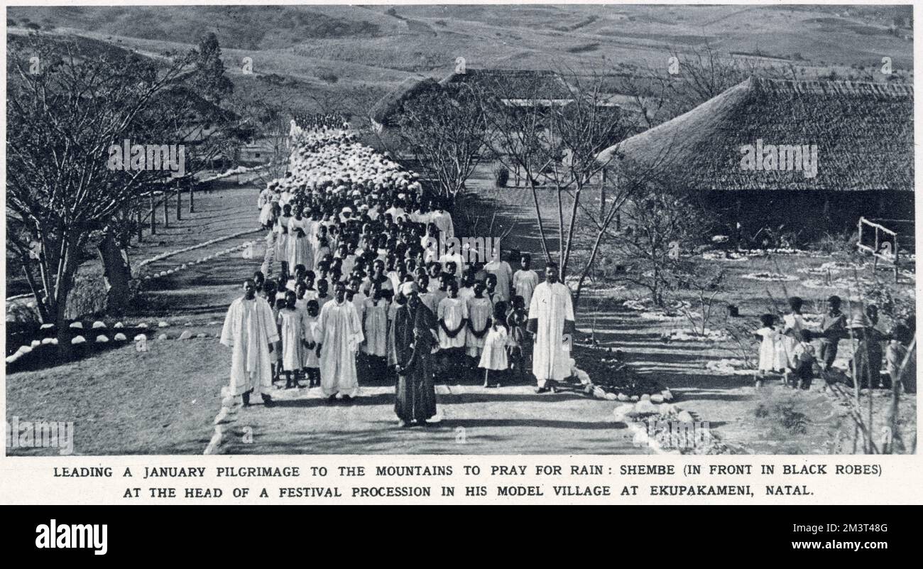 Shembe (in front in black robes) leading a January pilgrimage in his model village at Ekupakameni (eKuPhakameni), Natal, to the mountains to pray for rain. Isaiah Shembe (c.1865-1935) was a native prophet and healer of Inanda, Natal, and the founder of the Ibandla lamaNazaretha (Church of Nazareth), South Africa, the largest African-initiated church in Africa during his lifetime. Stock Photo