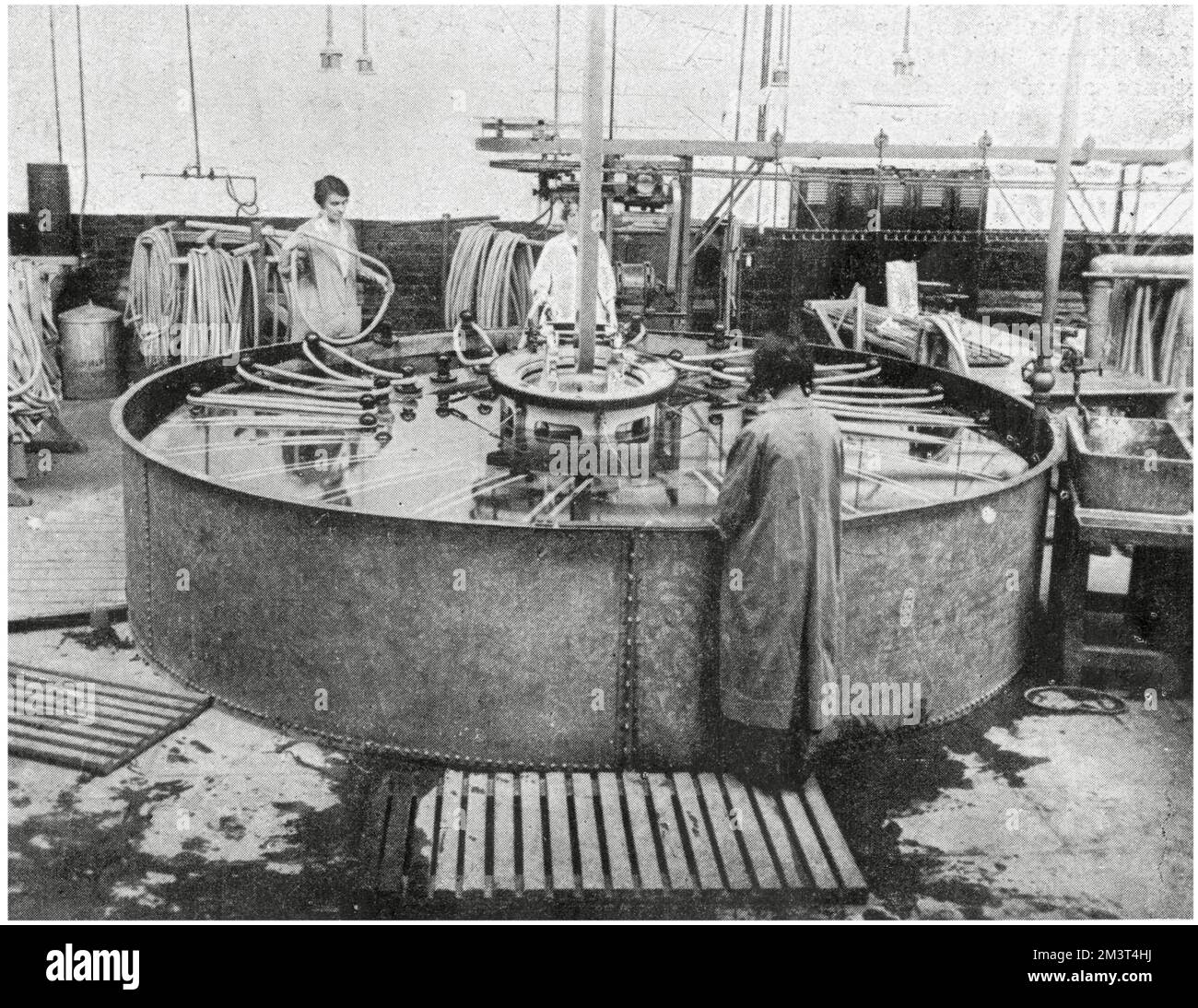 The original tyre factory for Dunlop Tyres at Fort Dunlop in the Erdington district of Birmingham. A tank for testing inner tubes. The tubes are inflated and stretched in the submerging. Stock Photo
