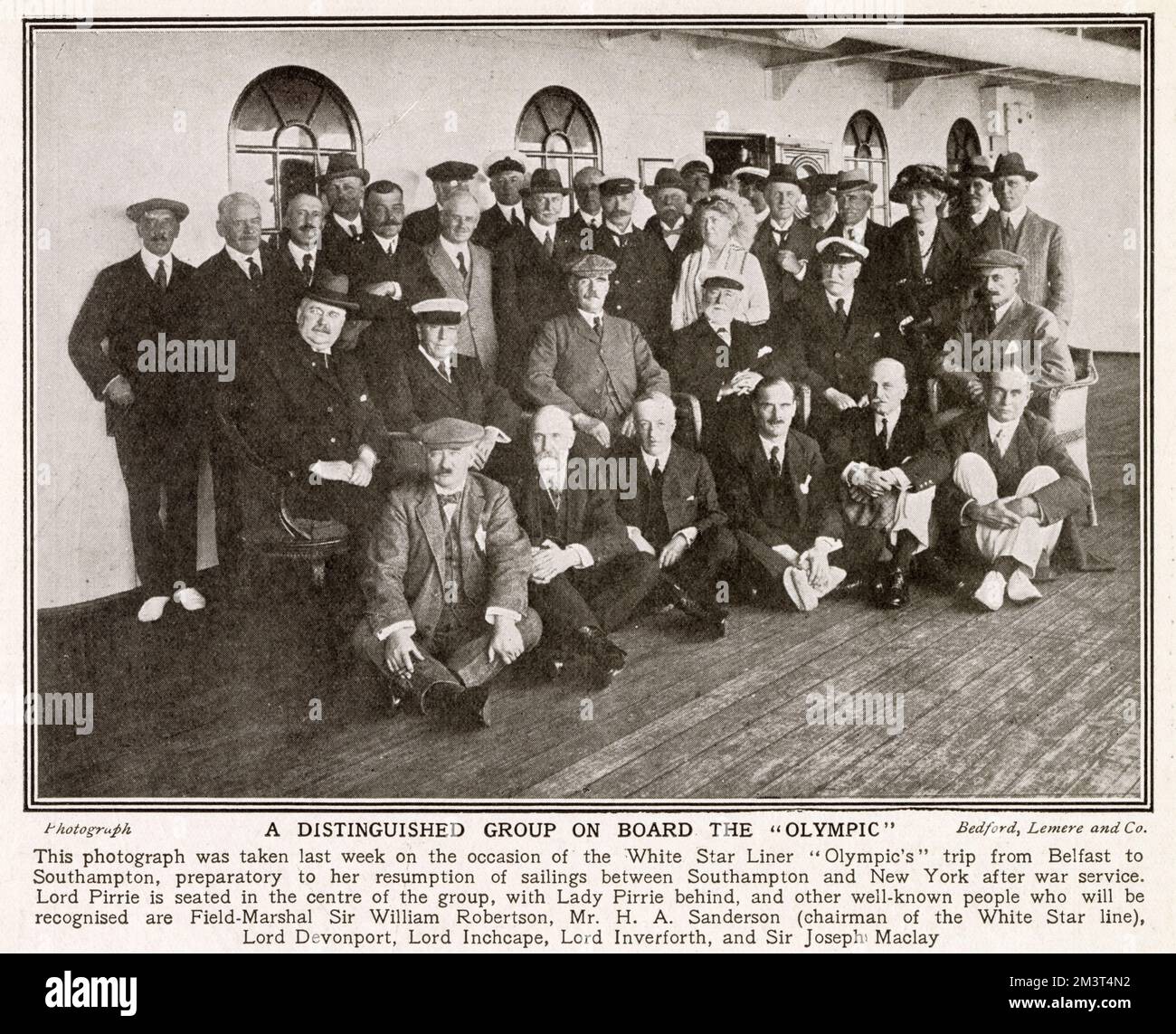 A group taken on board the White Star Line ship 'Olympic' during a trip from Belfast to Southampton in June 1920. Notable among the sitters is Lord Pirrie in the centre, with Lady Pirrie behind. Also in the picture is Field-Marshal Sir William Robertson, Mr. H. A. Sanderson (chairman of White Star Line), Lord Devonport, Lord Inchcape, Lord Inverforth and Sir Joseph McKay. Stock Photo