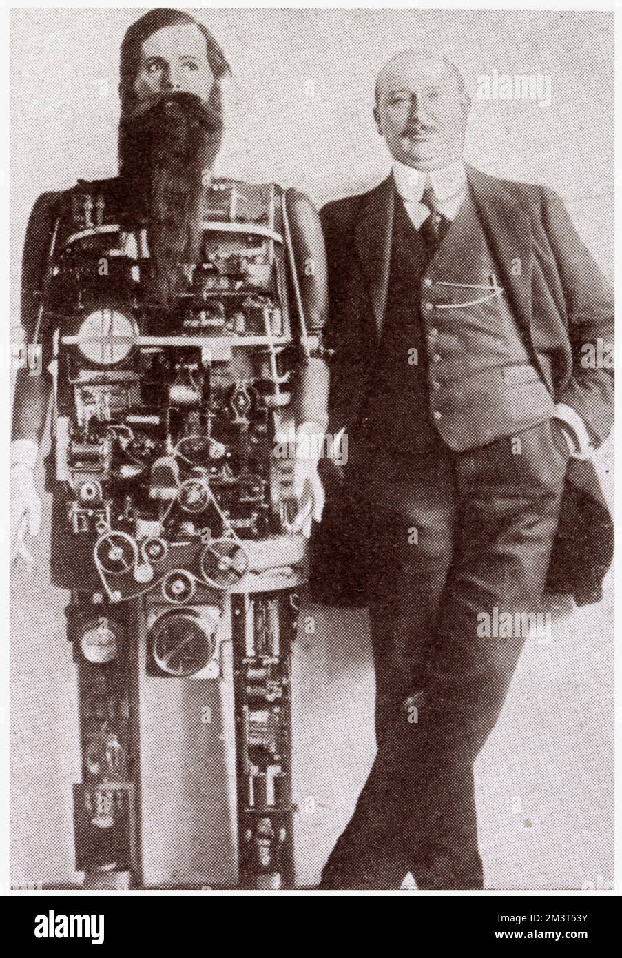 Berlin inventor Herr Widmann with his mechanical clockwork man that imitates the human movements, it could sing, laugh and whistle. Stock Photo
