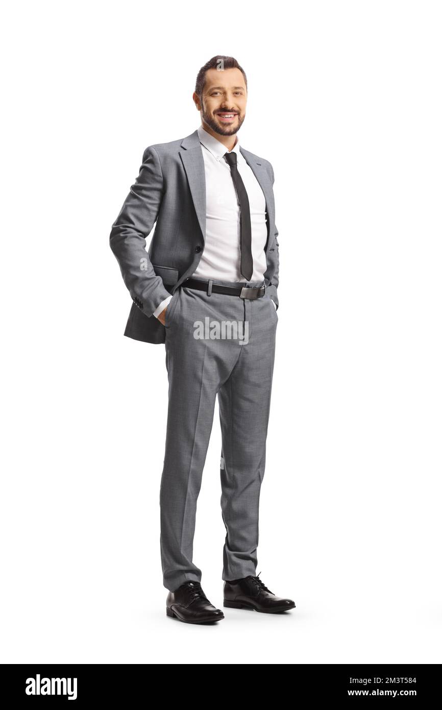 Full length shot of a smiling man in gray suit and tie isolated on white background Stock Photo