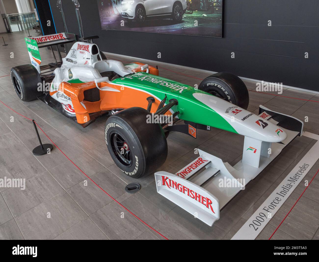 A Force India Mercedes VJM 02 Formula One (F1) racing car inside Mercedes-Benz Brooklands and Mercedes-Benz World, Weybridge, Surrey, UK. Stock Photo