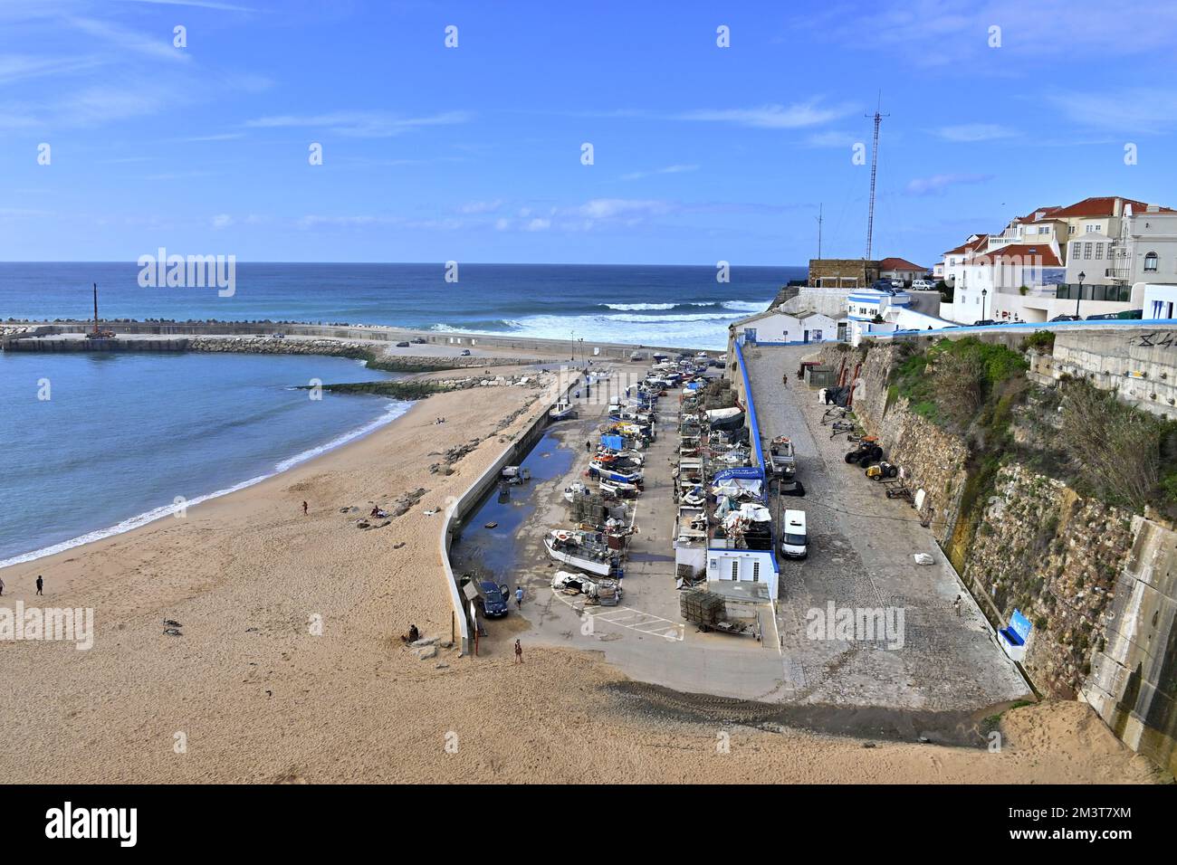 Landscape of the village of Ericeira with its traditional houses and fishing port on Pescadores beach, Portugal Stock Photo