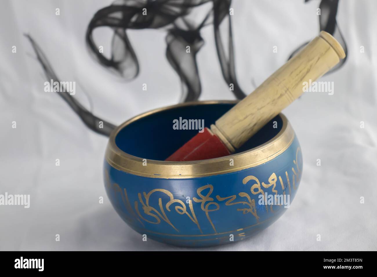 Hand Crafted bronze Indian Singing Bowl painted in Blue and Gold color