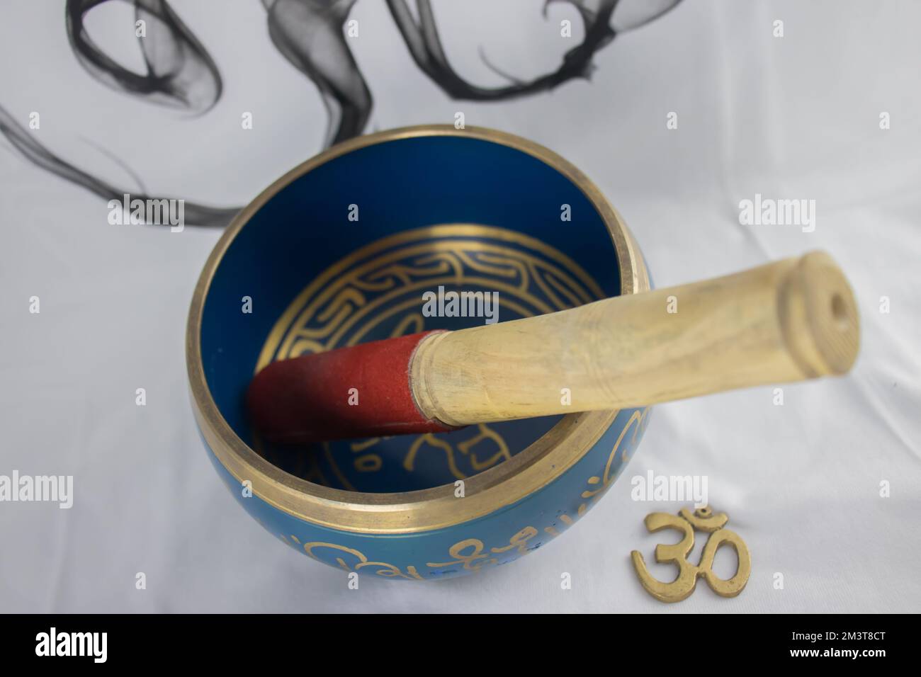 Hand Crafted bronze Indian Singing Bowl painted in Blue and Gold color