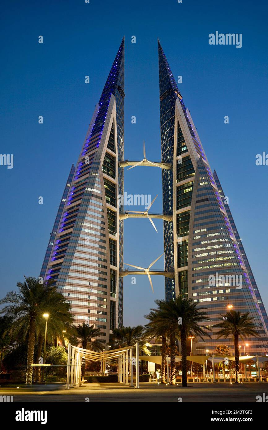 The sail-shaped towers and wind turbines of Bahrain World Trade Centre (Bahrain WTC) signify the maritime history of Manama, Bahrain Stock Photo
