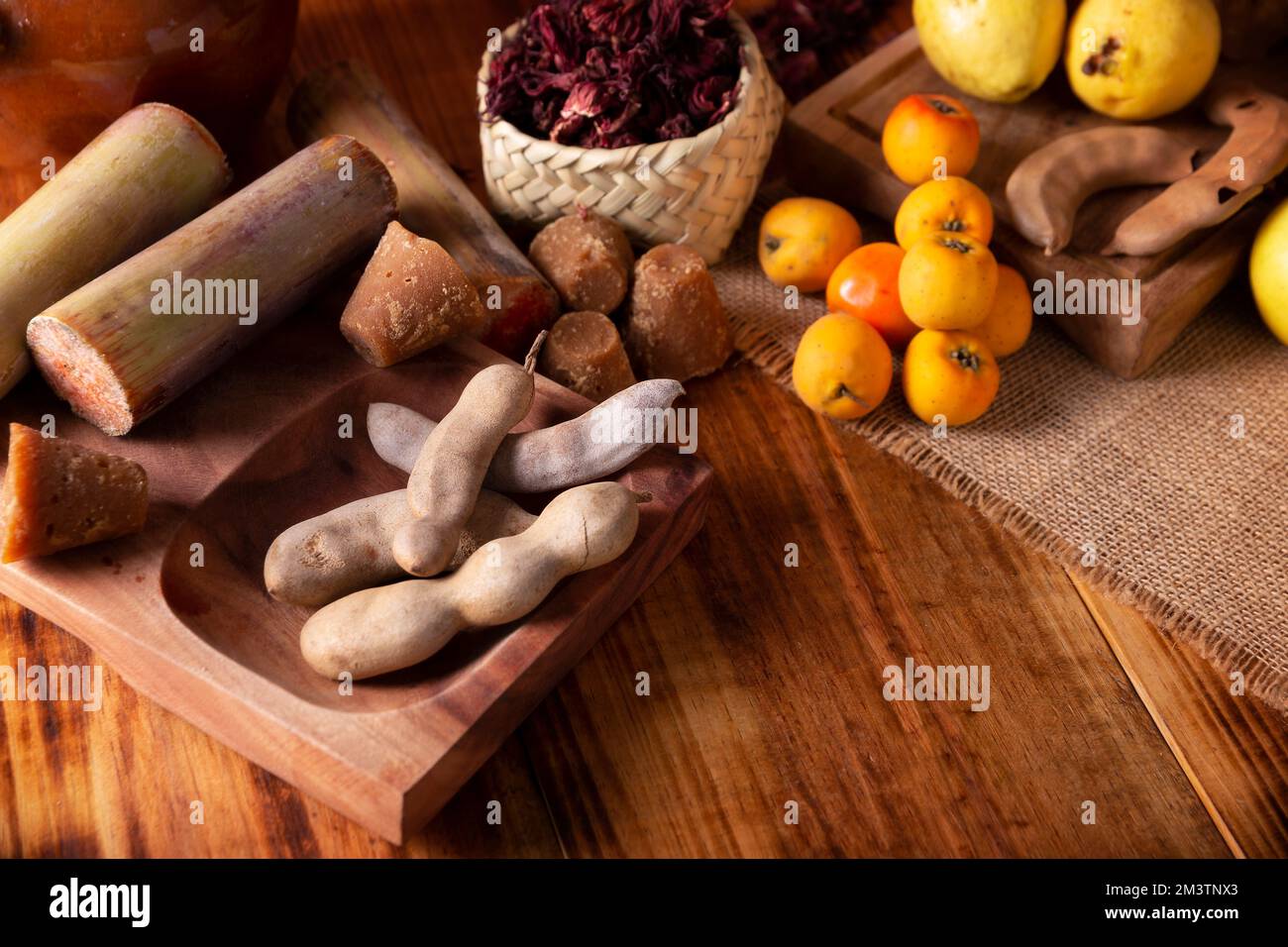 Basic ingredients to prepare Mexican fruit punch, a hot drink traditionally consumed during the December season at posadas and Christmas celebrations. Stock Photo