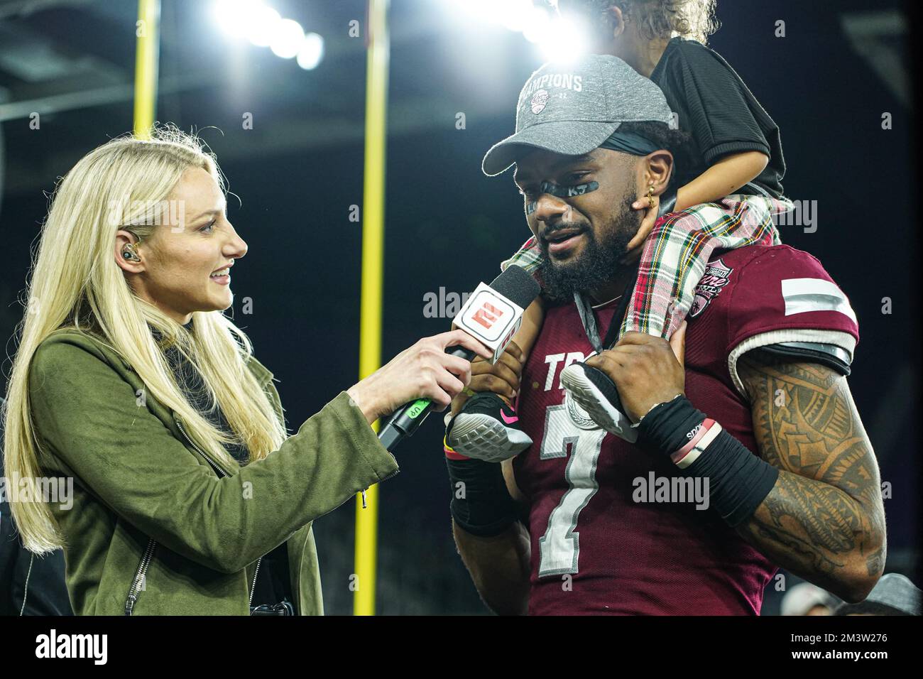 Orlando, Florida, USA, December 16, 2022,  Troy Trojans player Devonte Ross #7 receives the MVP trophy after wiining the Duluth Cure Bowl at Exploria Stadium.  (Photo Credit:  Marty Jean-Louis) Stock Photo