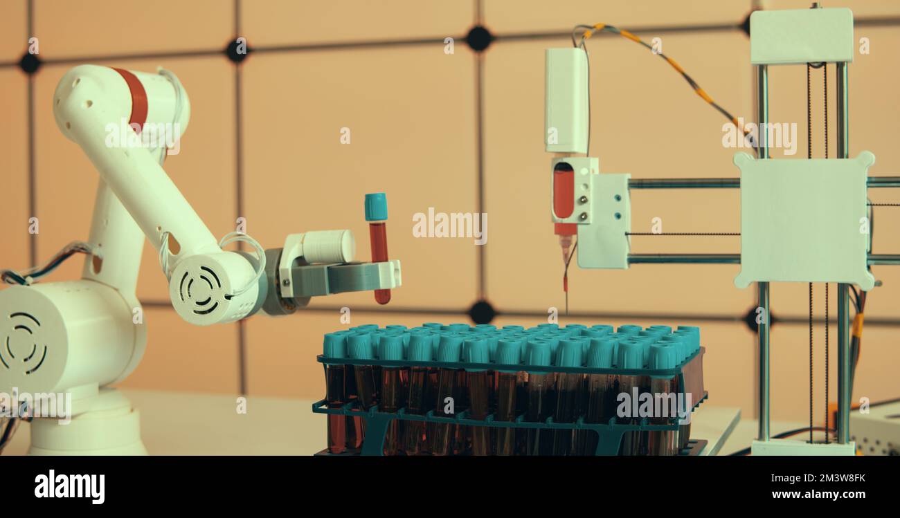 Robotic arm holding blood sample Stock Photo Alamy
