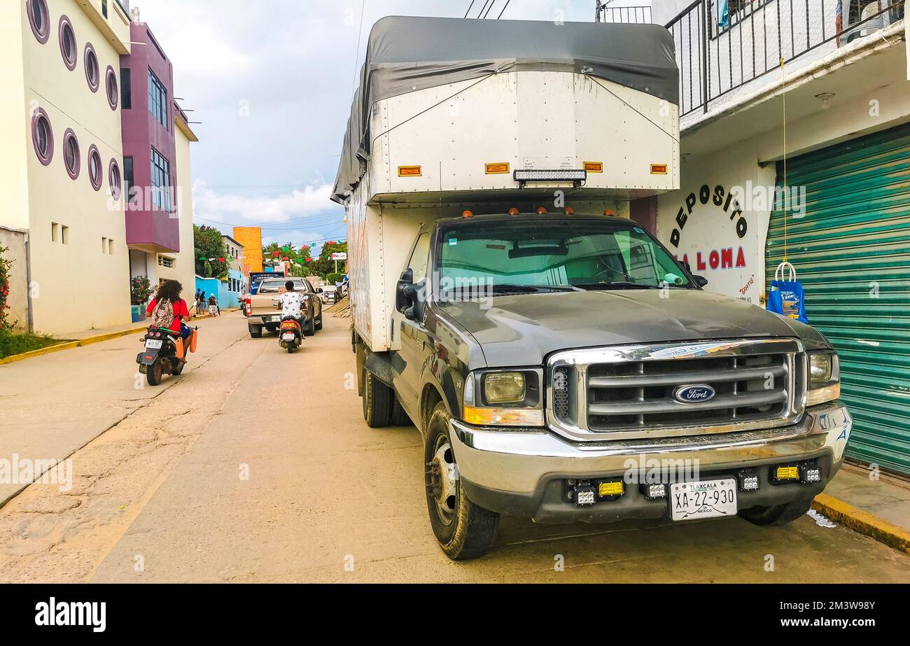 Various Mexican pickup trucks cars 4x4 Offroad vehicles in Puerto Escondido zicatela Oaxaca