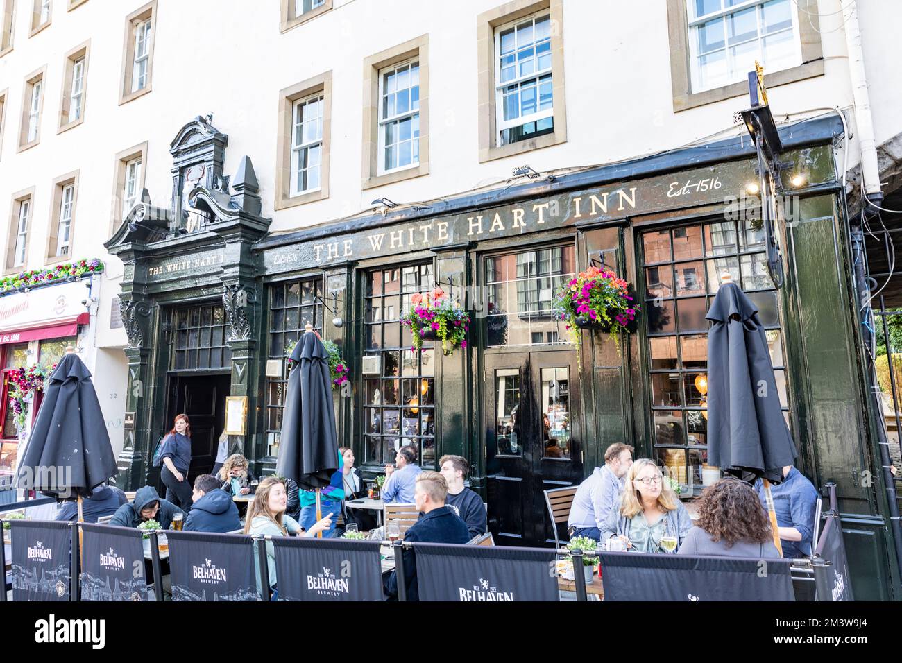 The White Hart Inn in Grassmarket Edinburgh old town with customers