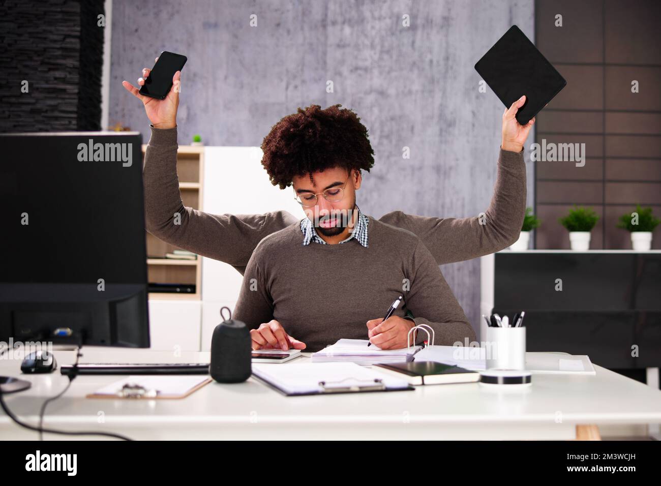 Happy Busy Business Man Multitasking. Employee Workload Stock Photo
