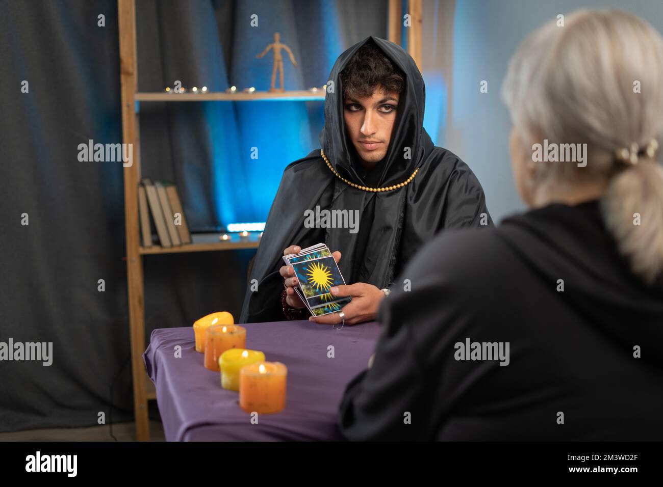 Tarot reader picking tarot cards.Fortune teller reading and forecasting Stock Photo