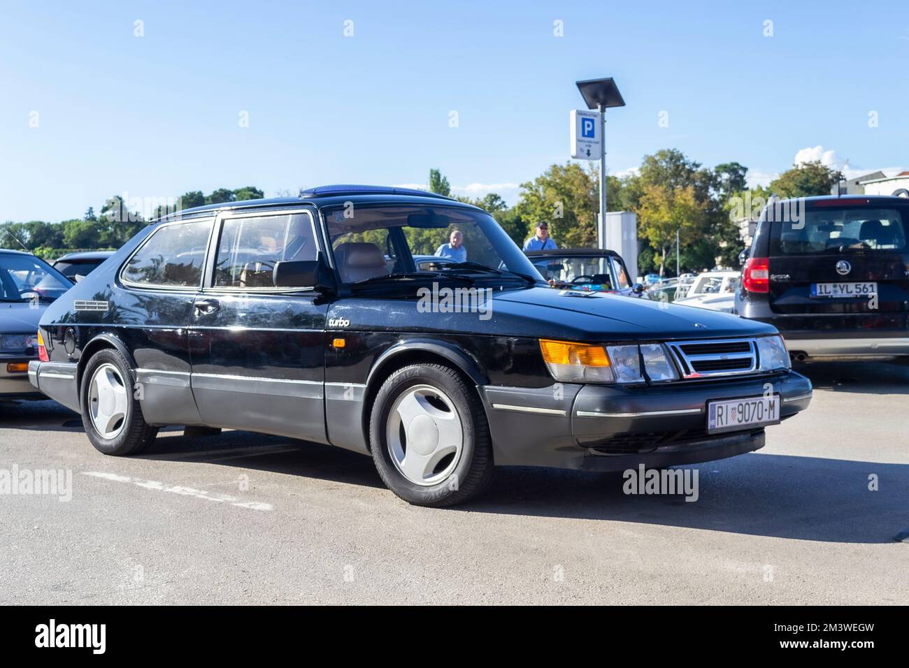 A black Saab 900 turbo, a classic old-timer car from the 1980s and 1990s Stock Photo