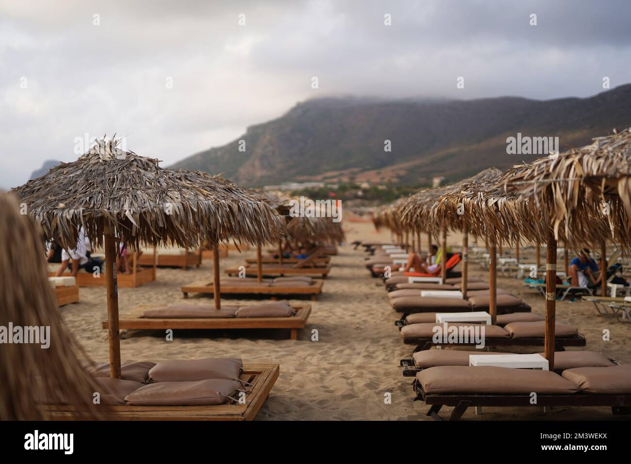 The Falasarna beach with thatched canopies and beach beds in Crete, Greece Stock Photo Alamy