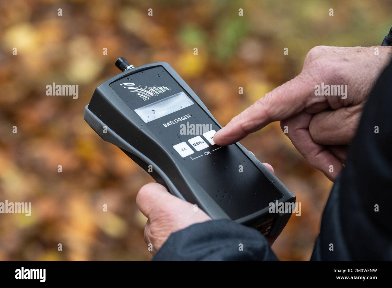 Hameln, Germany. 17th Nov, 2022. Rainer Marcek, bat regional supervisor of the Lower Saxony State Agency for Water Management, Coastal Protection and Nature Conservation (NLWKN), operates an ultrasonic detector for bats. The bat expert observes a decline in the population in the Weserbergland. (to dpa 'How wind turbines could become safer for bats') Credit: Swen Pförtner/dpa/Alamy Live News Stock Photo