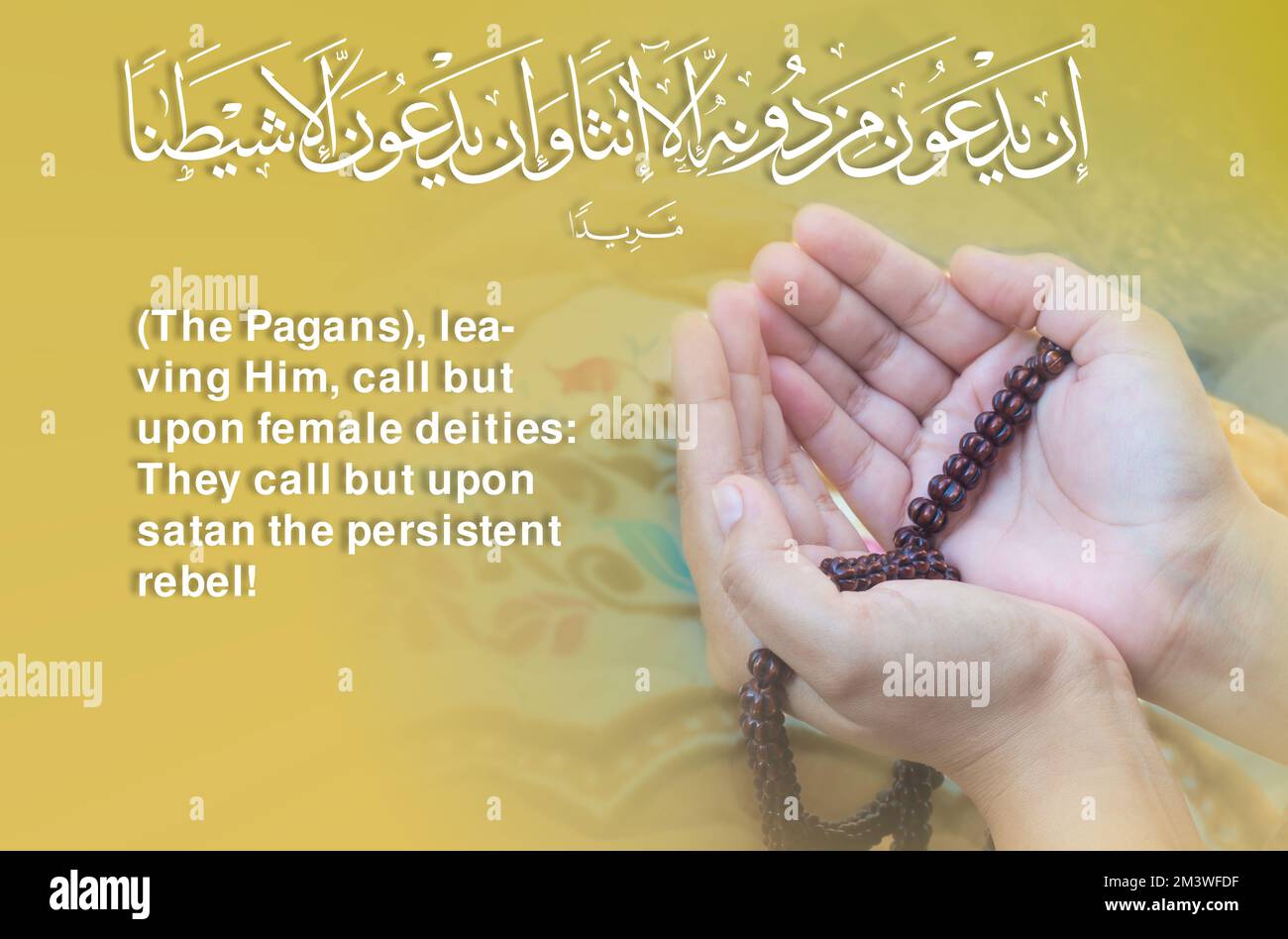 Young Muslim woman praying, Image of dua in Arabic with English translation Surah An Nisa Ayat 117, Open palm hand of Indonesia Islamic female with pr Stock Photo