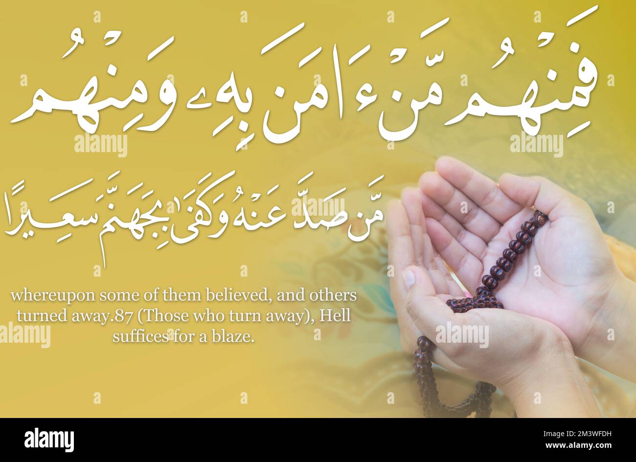 Young Muslim woman praying, Image of dua in Arabic with English translation Surah An Nisa Ayat 55 , Open palm hand of Indonesia Islamic female with pr Stock Photo