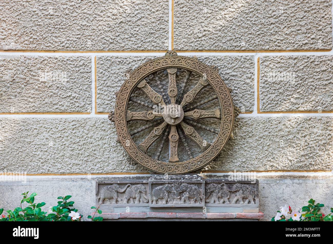 stone wheel engraved in the walls of Konark Sun Temple Stock Photo