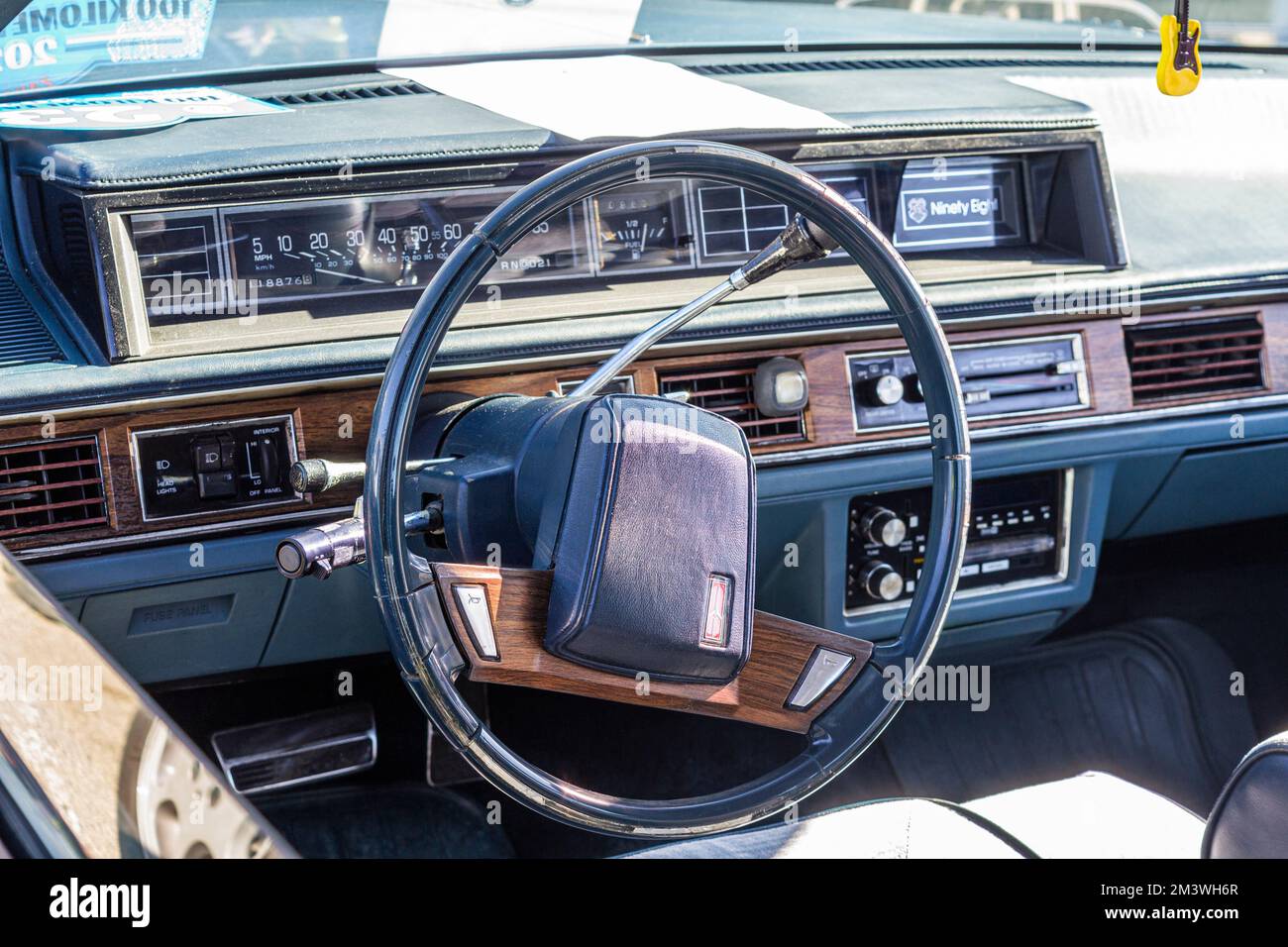 An interior view of an Oldsmobile 98 with a dashboard - a vintage luxury American car Stock Photo
