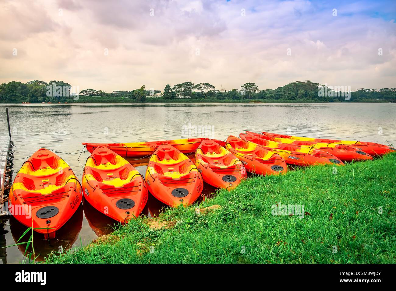 Canoes parking beside the pier at Lower Seletar Reservoir Park, Yishun