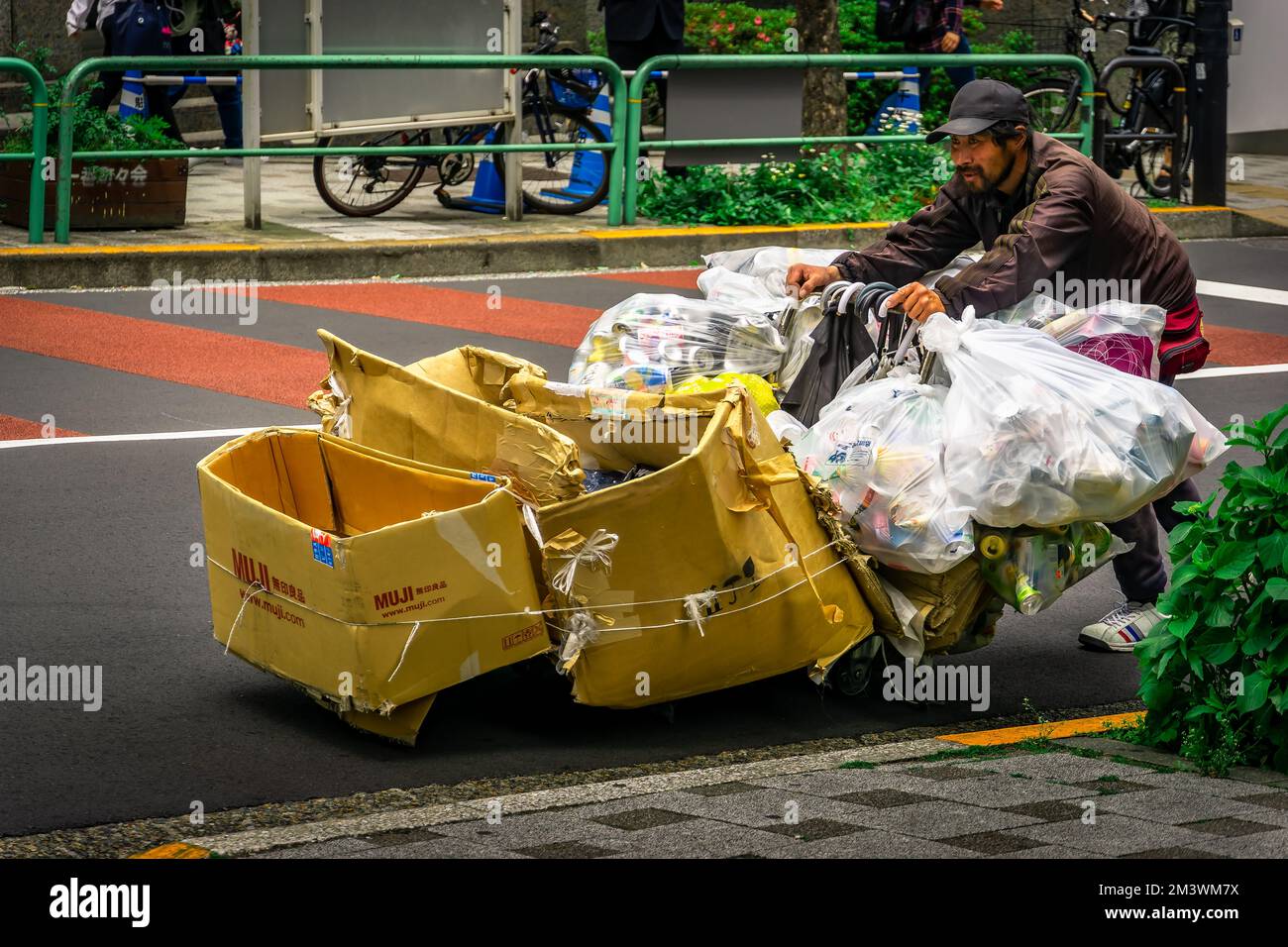 Recyclable materials collected by garbage collector in Tokyo Stock