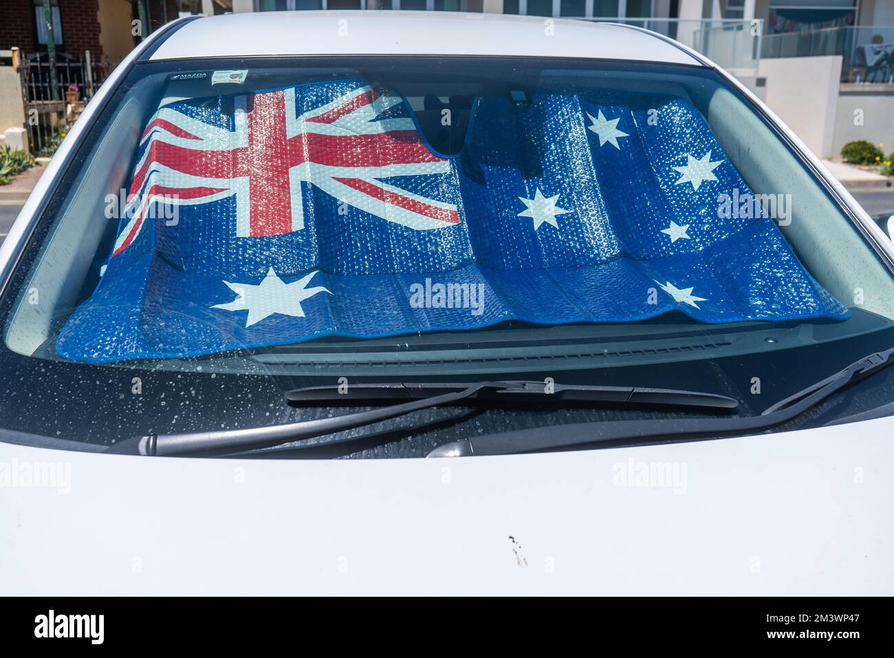 17 December 2022 Sun shade with Australian flag in car windscreen, Adelaide, Australia Stock