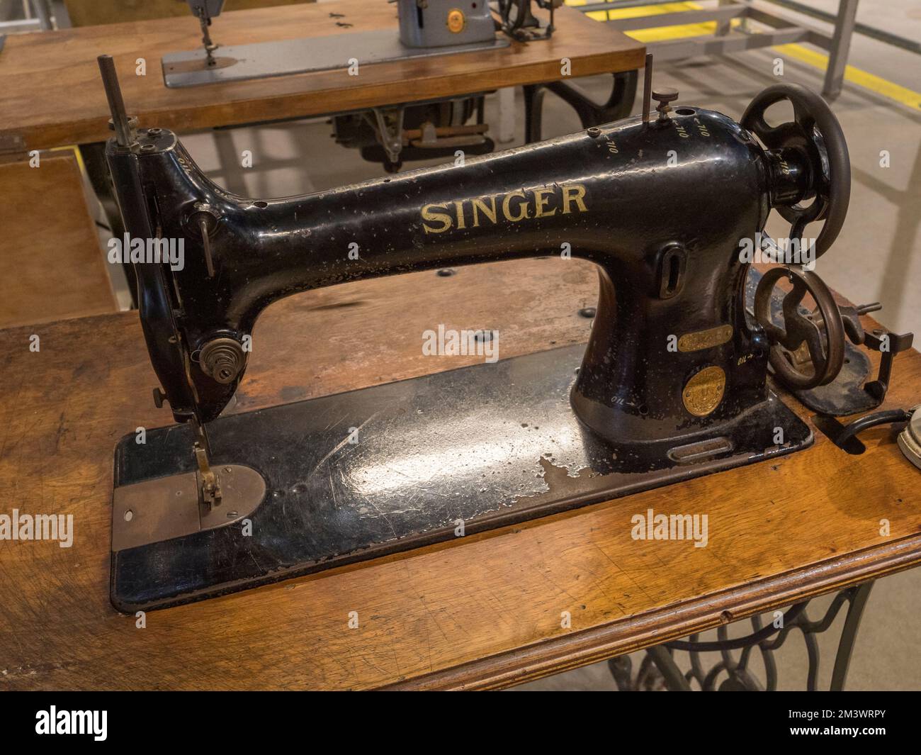 A Singer industrial sewing machine (c1920) used to make fabric-covered aircraft on display in the Bellman Hanger, Brooklands Museum, Surrey, UK Stock Photo