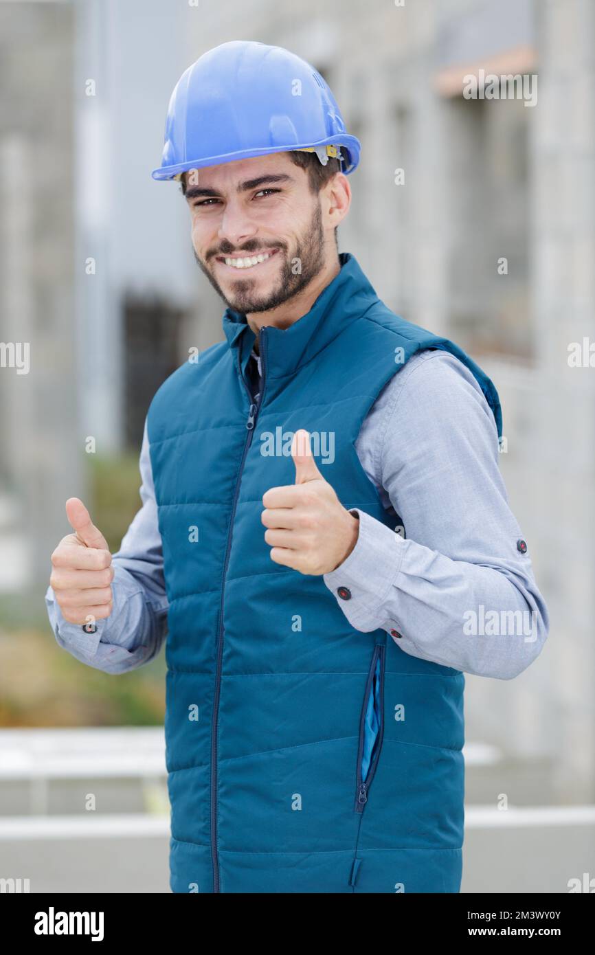 Group smiling builders in hi-res stock photography and images - Alamy