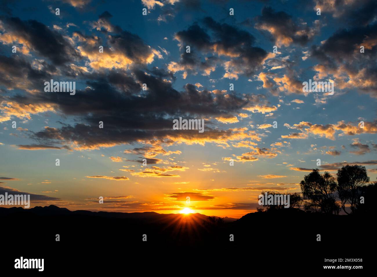 Colourful sunset in MacDonnell Ranges. Stock Photo