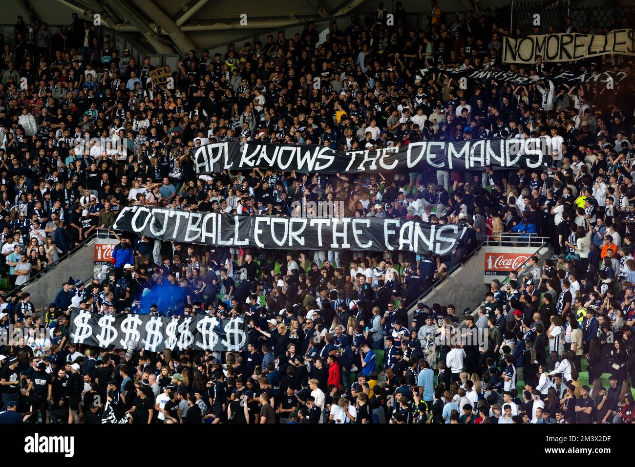Melbourne, Victoria, Australia. 17 Dec 2022. Melbourne Victory fans hold up a sign protesting the recent decision to host the A-League Grand Final in Sydney. Stock Photo