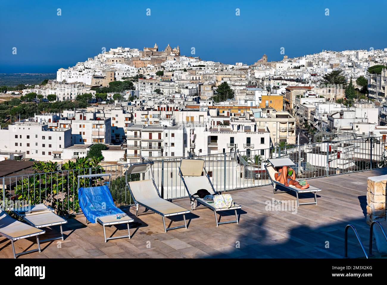 Apulia Puglia Italy. Ostuni. Elevated view of the town from the a rooftop pool Stock Photo
