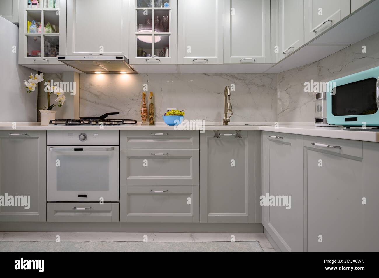 New light grey modern well designed kitchen interior, front view Stock ...