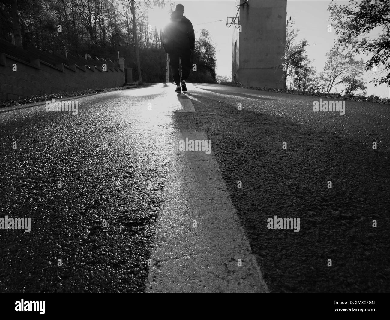 Man walk along path Black and White Stock Photos & Images - Alamy