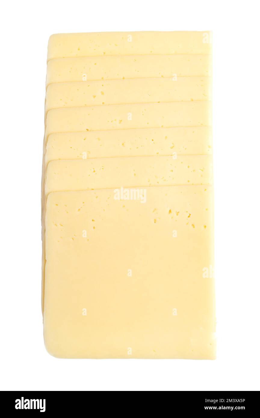 Stack of gouda cheese slices, isolated, from above. Sliced sweet, creamy and yellow cheese, made of cow milk, originated from Gouda in the Netherlands. Stock Photo