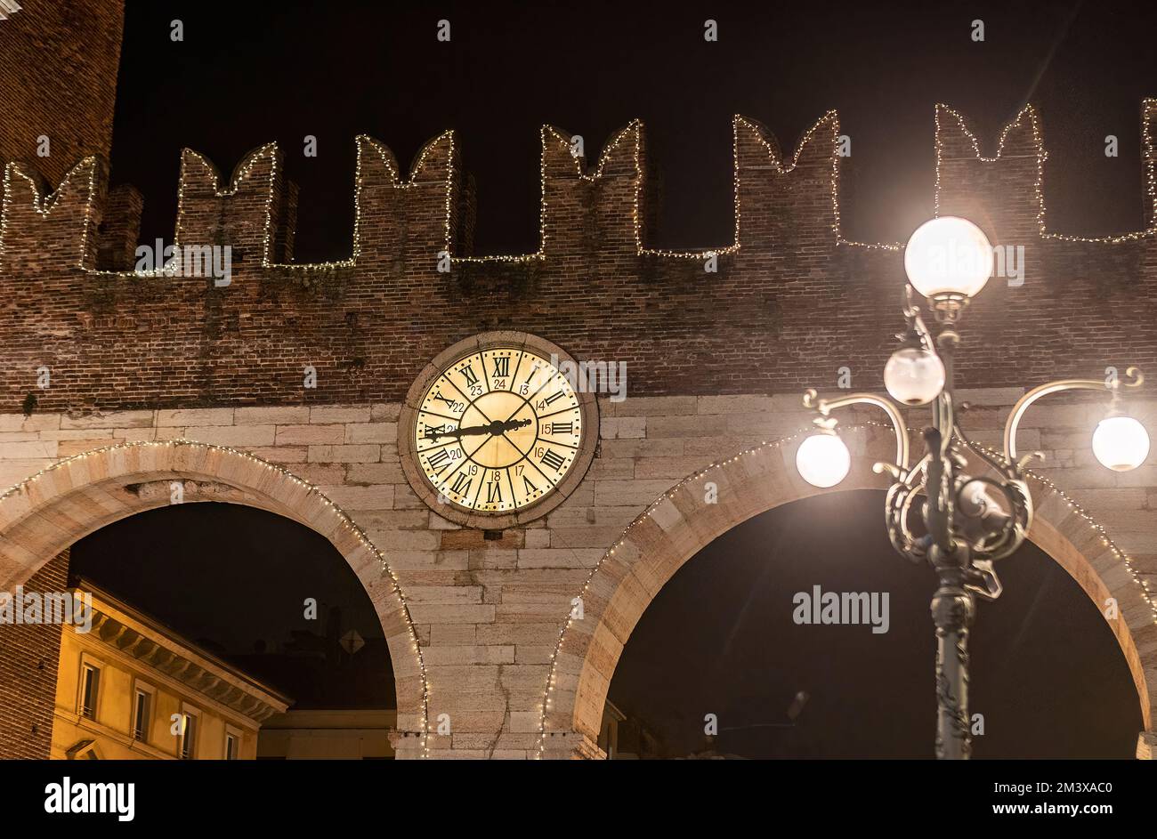 Verona Porta Bra at night Stock Photo - Alamy