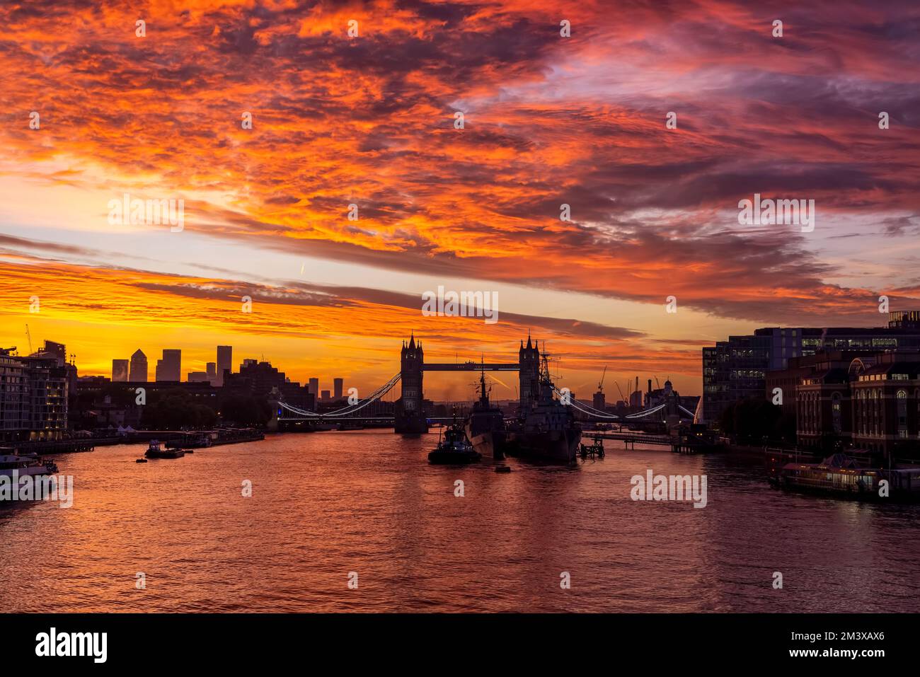 A intense, red sunrise behind the skyline of London, England Stock Photo Alamy