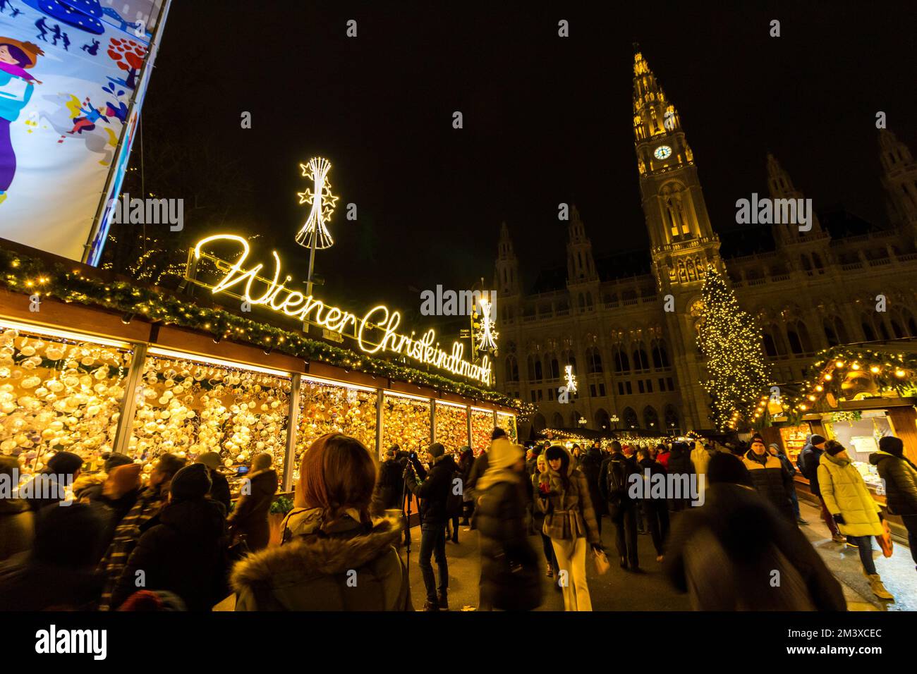 People visiting Wiener Christkindlmarkt, Rathaus Platz (City Hall Square), Vienna, Austria Stock Photo