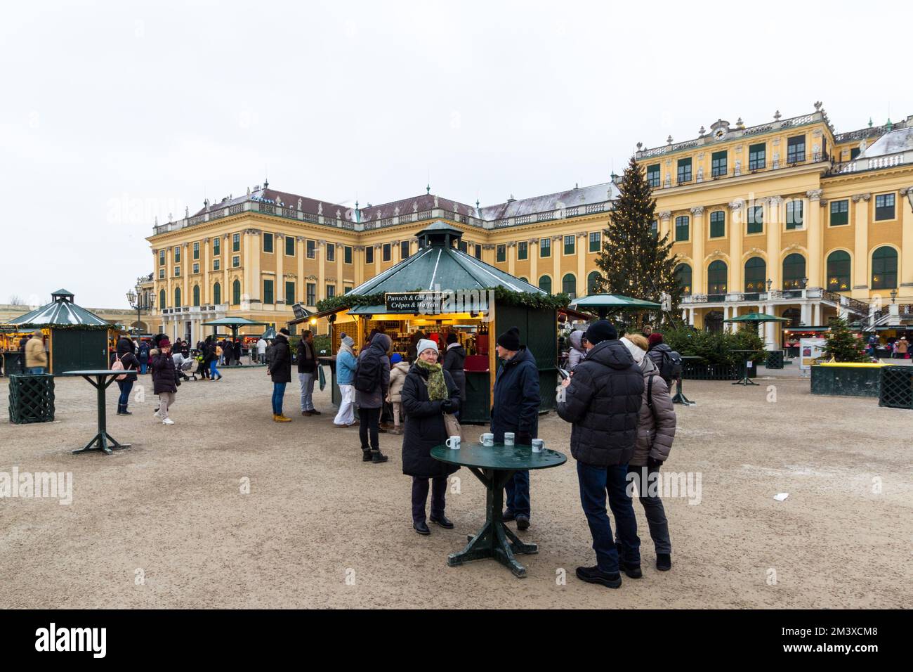People visiting the Christmas Market at Schonbrunn Palace, Vienna, Austria Stock Photo