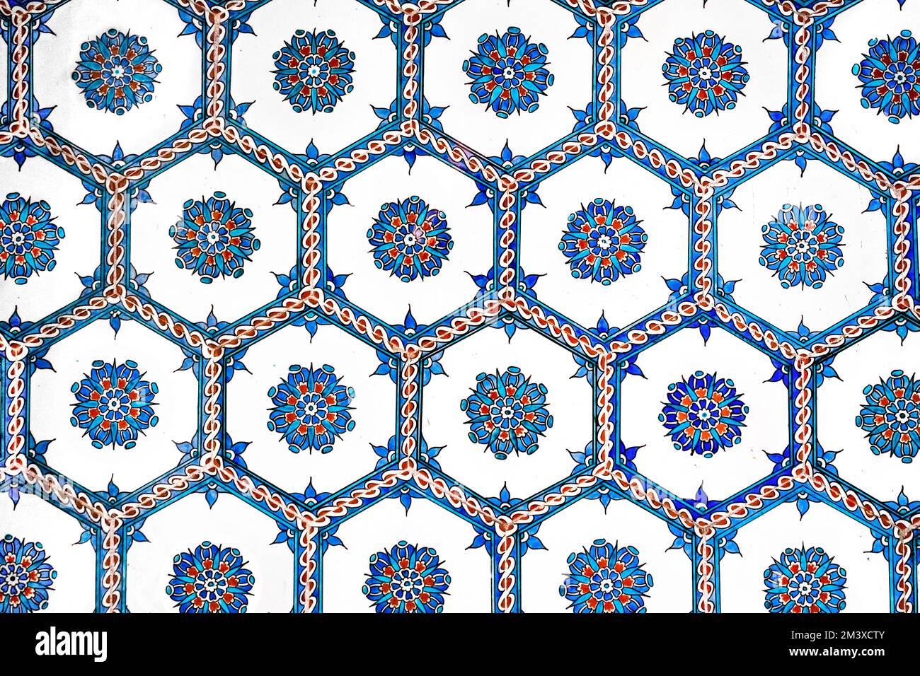 Ottoman Iznik hexagon tile with floral patterns. Stock Photo