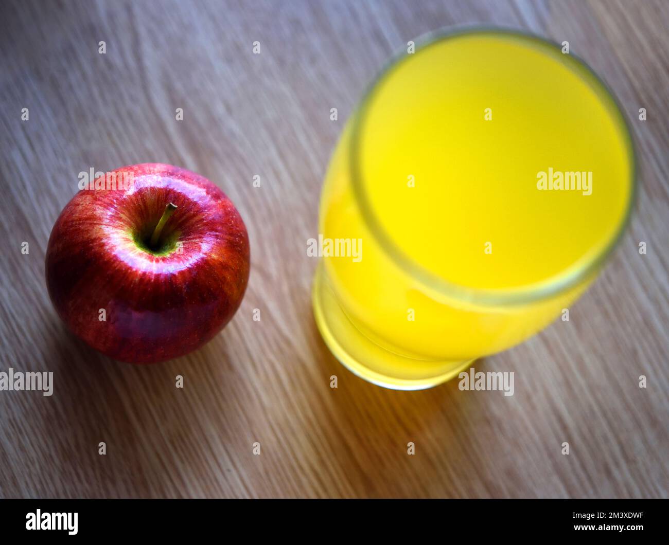 Glass of orange juice and apple Stock Photo