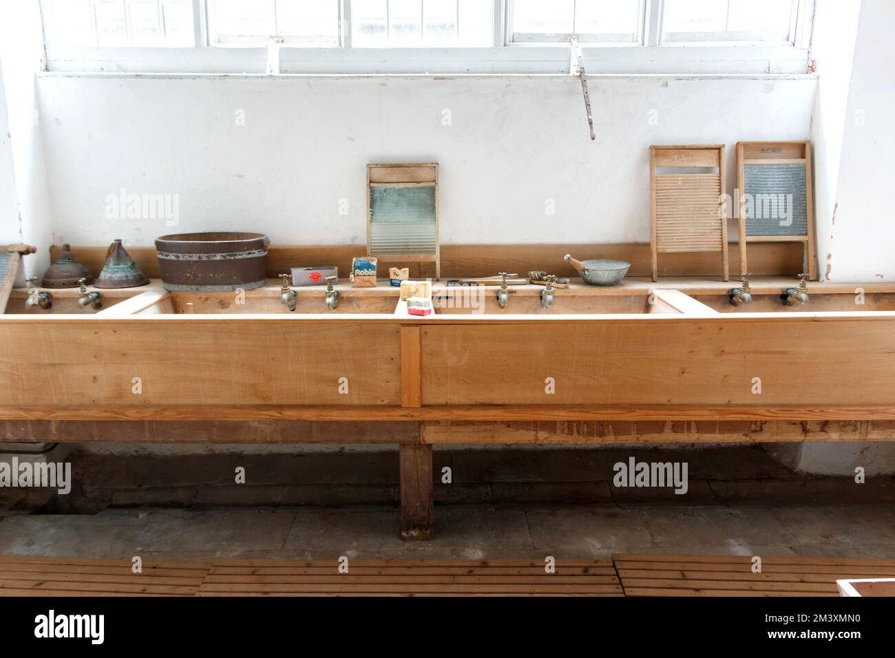 vintage wooden sinks in old English house washroom or scullery  Killerton House National trust property Stock Photo