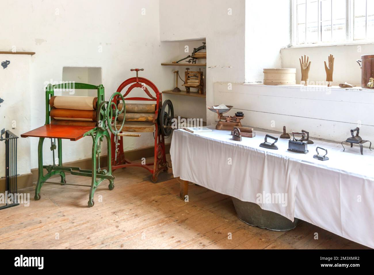 laundry mangles in old English house washroom or scullery  Killerton House National trust property Stock Photo
