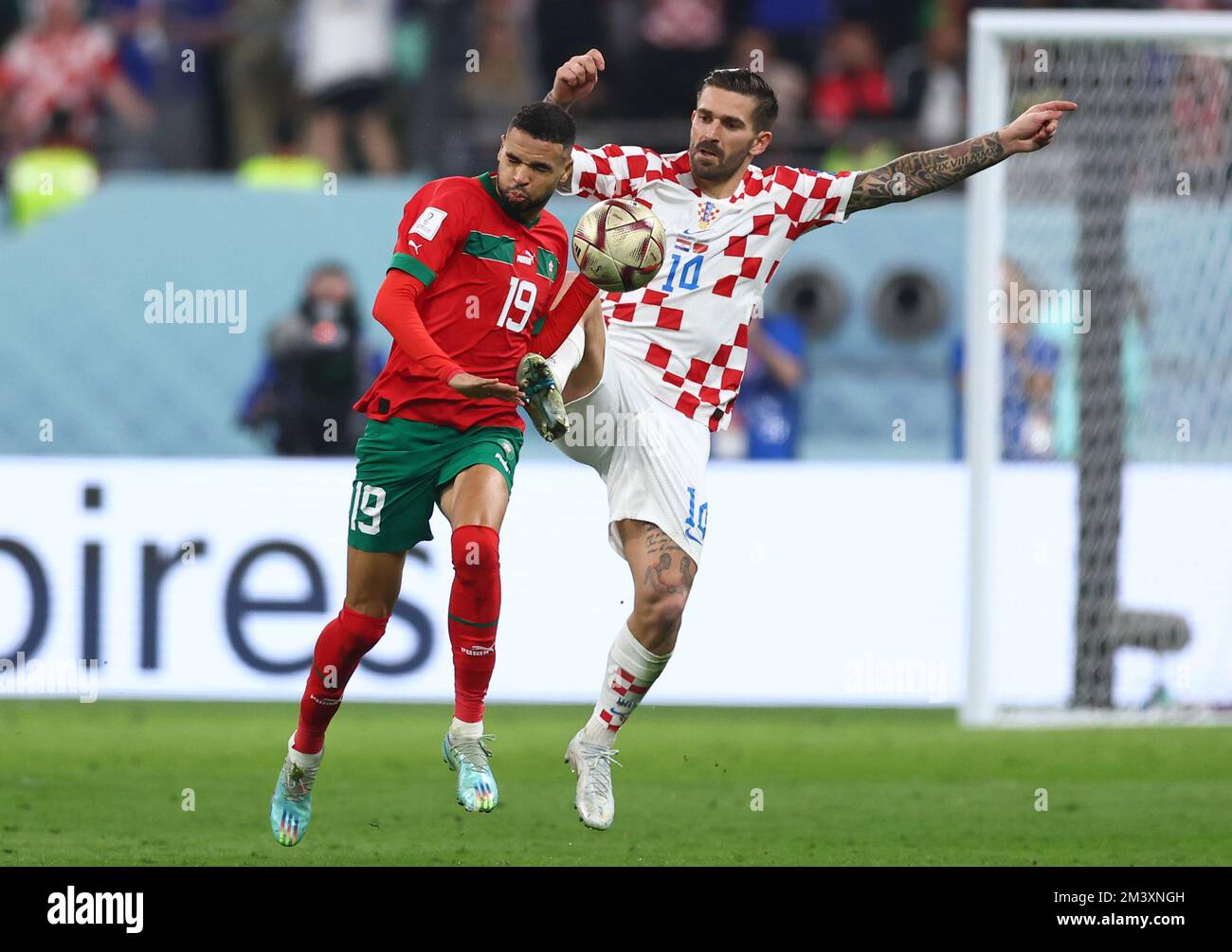 Doha, Qatar. 17th Dec, 2022. Youssef En-Nesyri of Morocco challenged by Marko Livaja of Croatia during the FIFA World Cup 2022 match at Khalifa International Stadium, Doha. Picture credit should read: David Klein/Sportimage Credit: Sportimage/Alamy Live News Stock Photo