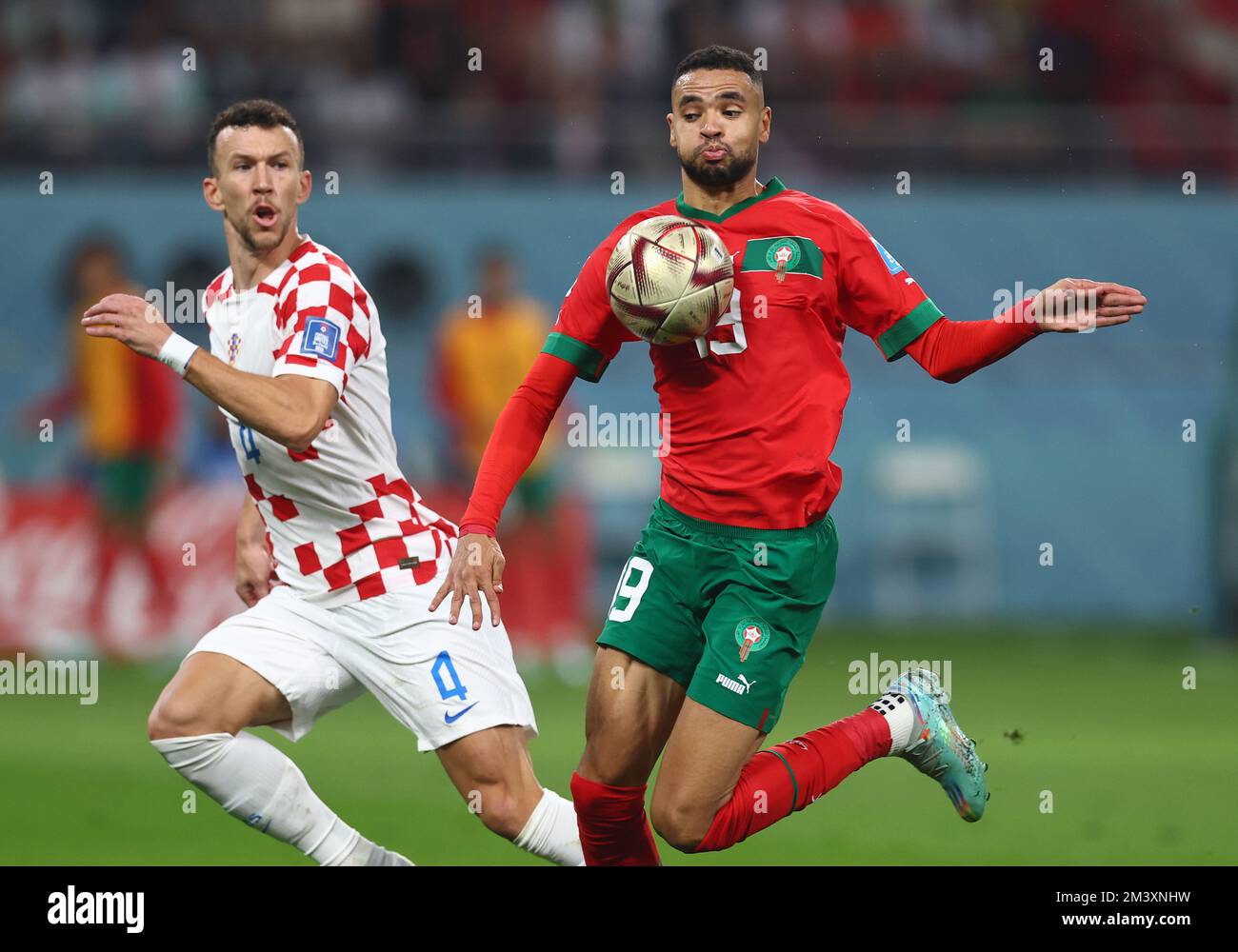 Doha, Qatar. 17th Dec, 2022. Youssef En-Nesyri of Morocco and Ivan Perisic of Croatia during the FIFA World Cup 2022 match at Khalifa International Stadium, Doha. Picture credit should read: David Klein/Sportimage Credit: Sportimage/Alamy Live News Stock Photo