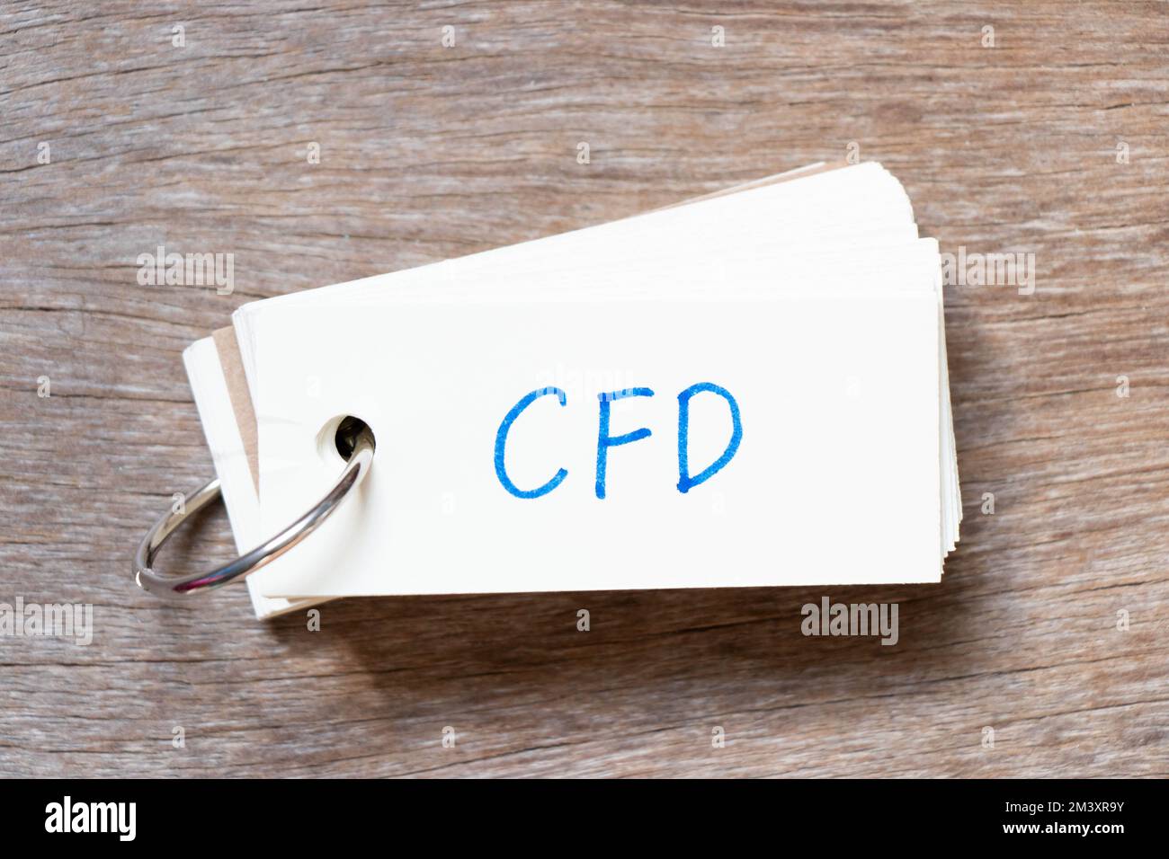 Flash card with handwriting in word cfd abbreviation of contract for