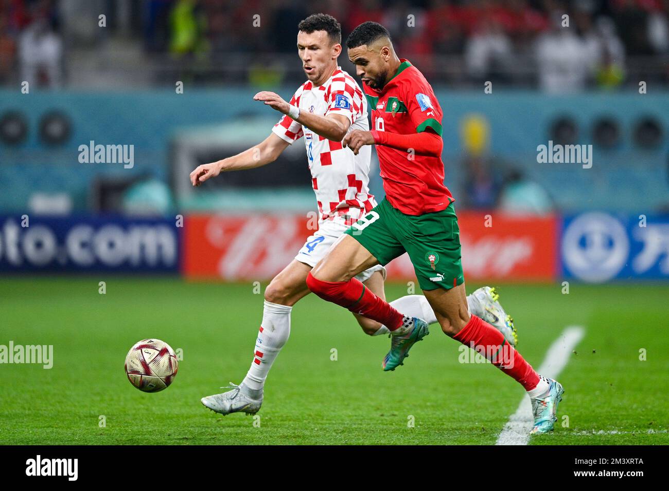 DOHA, QATAR - DECEMBER 17: Ivan Perisic of Croatia battles for the ball with Youssef En Nesyri of Morocco during the 3rd Place - FIFA World Cup Qatar 2022 match between Croatia and Morocco at the Khalifa International Stadium on December 17, 2022 in Doha, Qatar (Photo by Pablo Morano/BSR Agency) Stock Photo