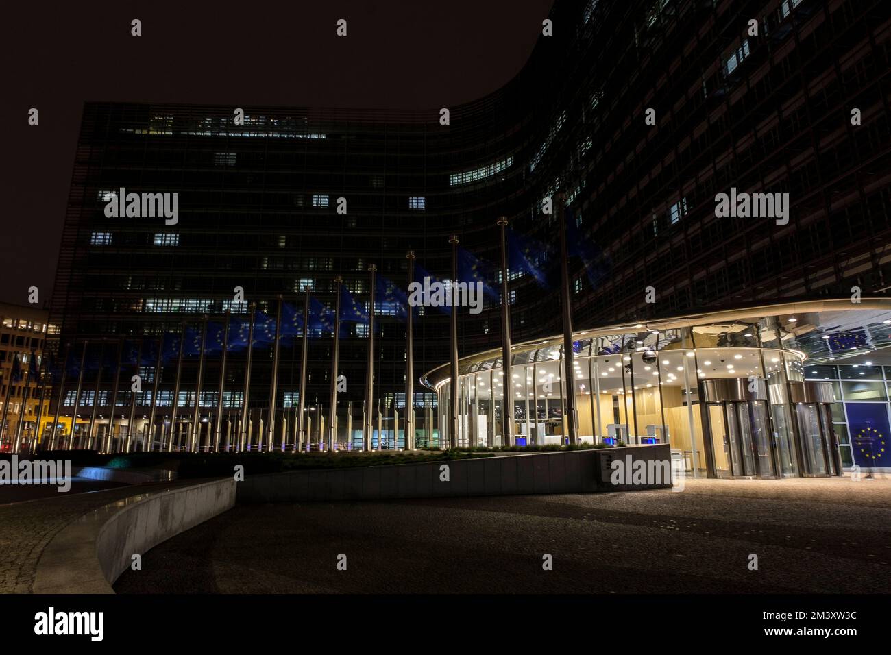 European union building of offices enlighted at night during an energy crisis. Berlaymont - European commission | Batiment de bureaux de l'union europ Stock Photo