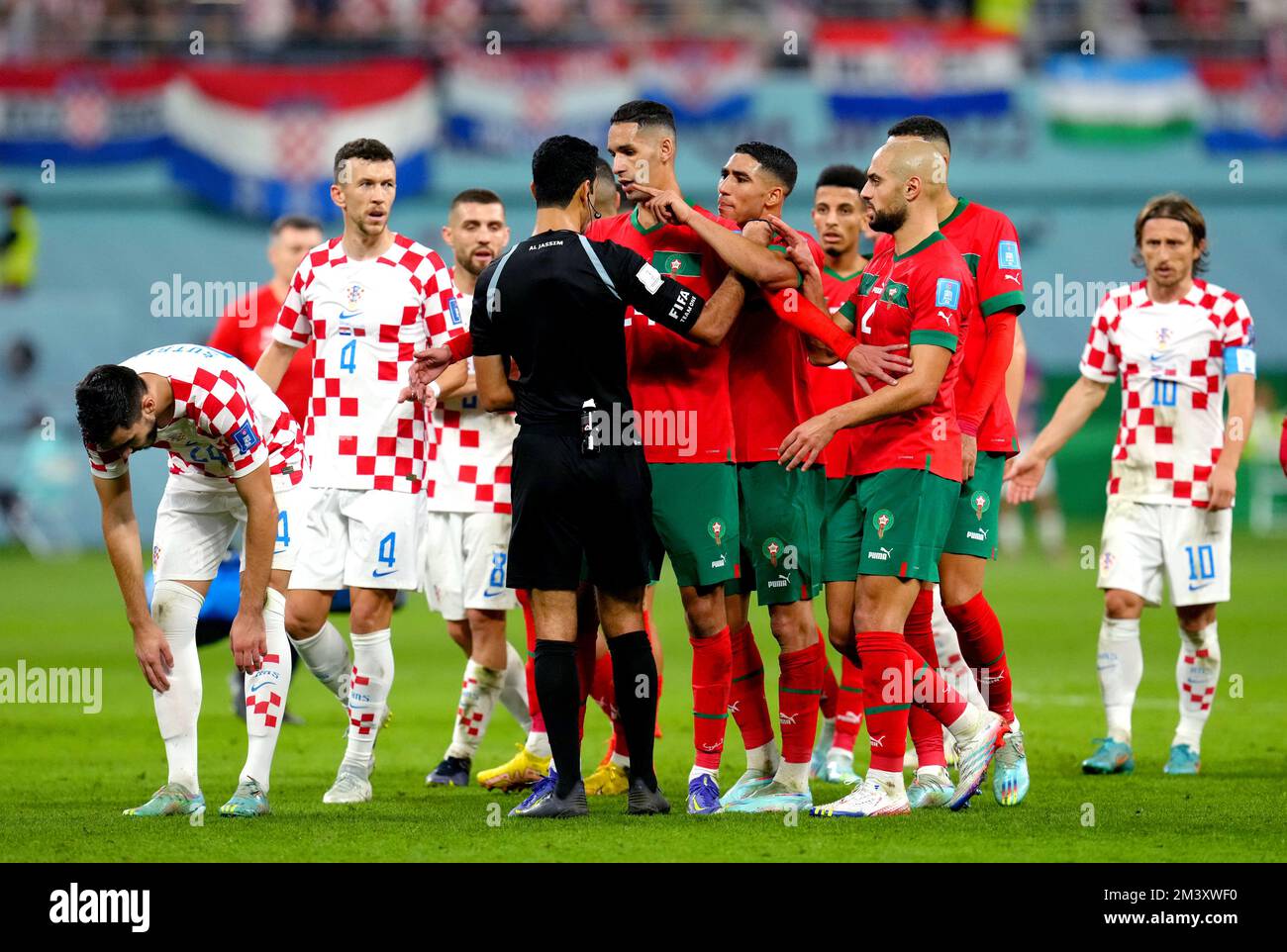 Morocco's Achraf Hakimi points at referee Abdulrahman Al-Jassim as they exchange words during the FIFA World Cup third place play-off match at the Khalifa International Stadium, Doha. Picture date: Saturday December 17, 2022. Stock Photo