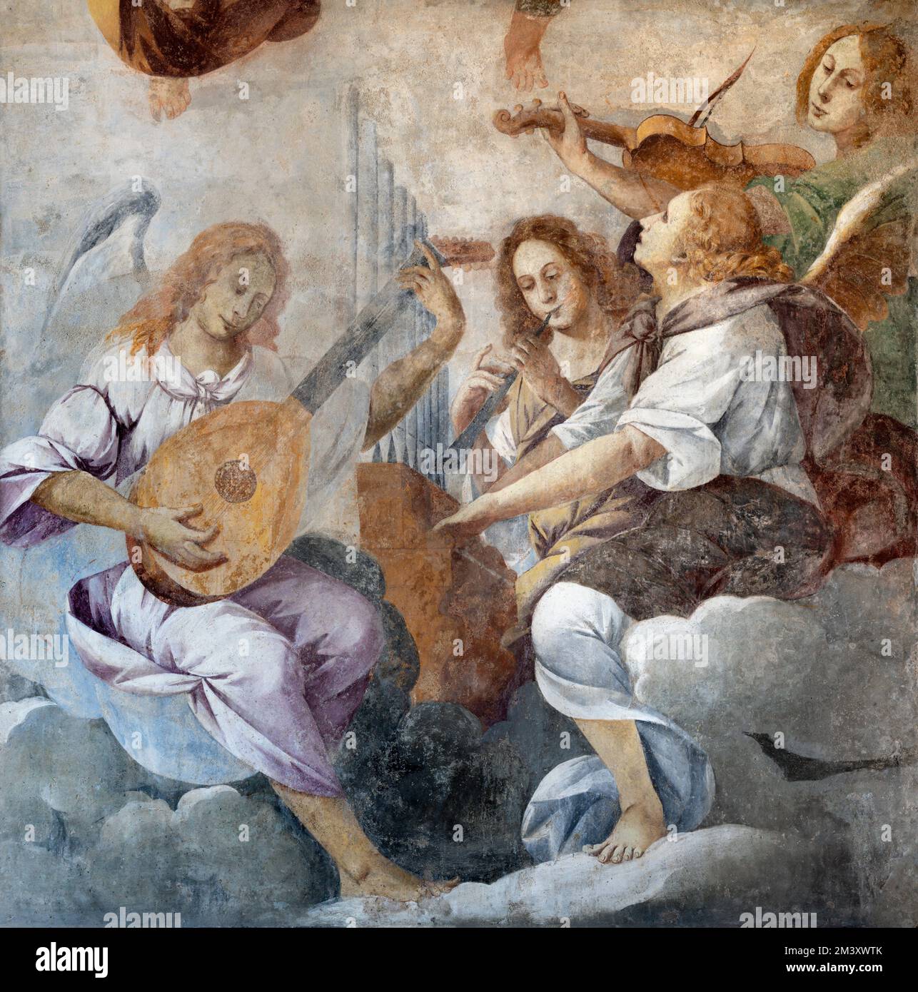 DOMODOSSOLA, ITALY - JULY 19, 2022: The baroque fresco of angels with the music instruments in the church Chiesa dei Santi Gervasio e Protasio Stock Photo